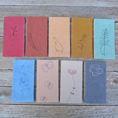 slim handbound journals: embroidered