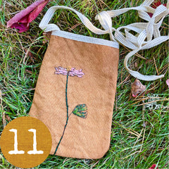 embroidered plant-dyed pocket purse