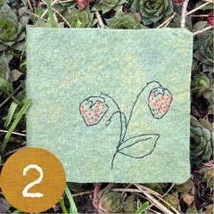 chubby little plant-dyed felt journal with botanical stitching