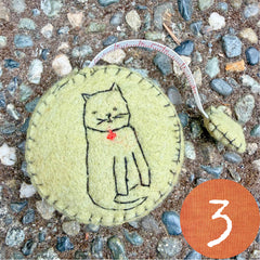 plant-dyed cat tape measures