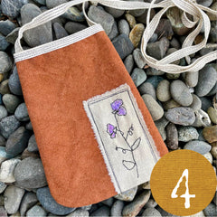 plant-dyed pocket purse with embroidered botanical patch