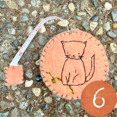 plant-dyed cat tape measures