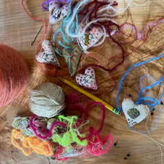 heavily stitched wool felt hearts