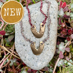 arch necklace in a plant-dyed matchbox