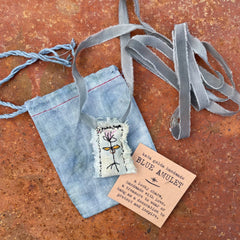 blue amulet: a lucky charm to protect & inspire
