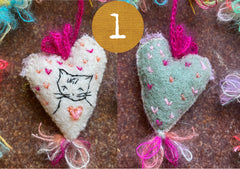 heavily stitched cat hearts in honor of jeff