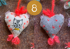 heavily stitched cat hearts in honor of jeff