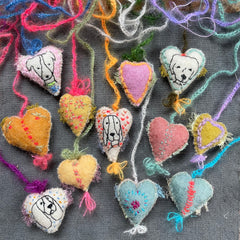 new batch! heavily stitched dog & cat wool felt hearts (fundraiser for pasadena humane)