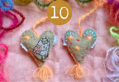 heavily stitched wool felt hearts