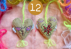 heavily stitched wool felt hearts