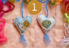 heavily stitched wool felt hearts