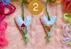heavily stitched wool felt hearts