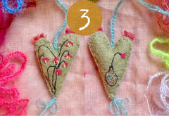 heavily stitched wool felt hearts