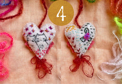 heavily stitched wool felt hearts