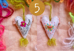 heavily stitched wool felt hearts