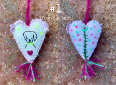 heavily stitched wool felt hearts