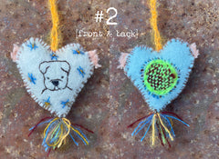 heavily stitched wool felt hearts