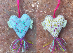 heavily stitched wool felt hearts