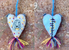 heavily stitched wool felt hearts