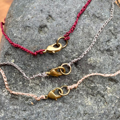 heart necklace in a plant-dyed matchbox