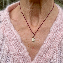 heart necklace in a plant-dyed matchbox