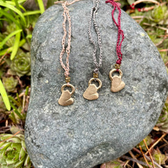 heart necklace in a plant-dyed matchbox