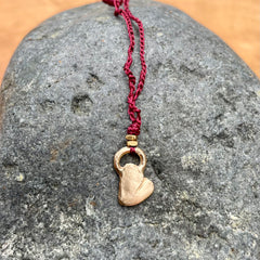 heart necklace in a plant-dyed matchbox