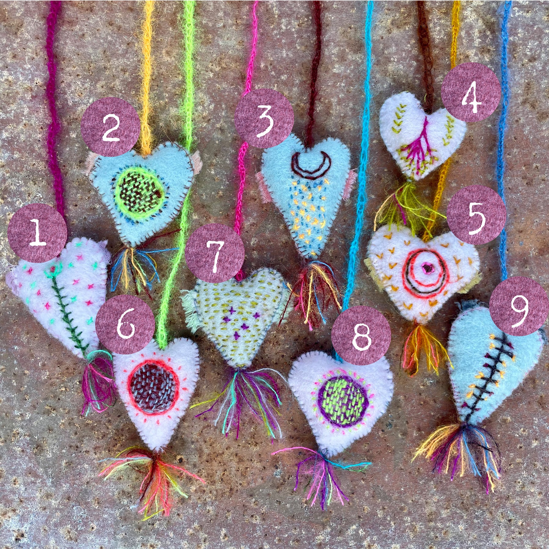 heavily stitched wool felt hearts – kata golda handmade