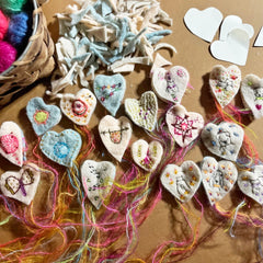 heavily stitched wool felt hearts