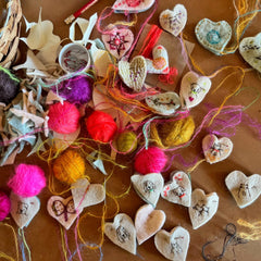 heavily stitched wool felt hearts