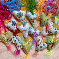 heavily stitched wool felt hearts