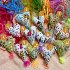heavily stitched wool felt hearts