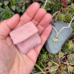 lock necklace on silk cordage in a little plant-dyed felt pocket