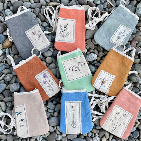 plant-dyed pocket purse with embroidered botanical patch