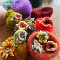 plant-dyed wool flower pins