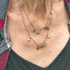 five charm necklace: pebble and pond