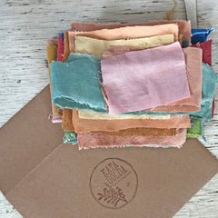 remnant envelope: assortment of plant-dyed textiles
