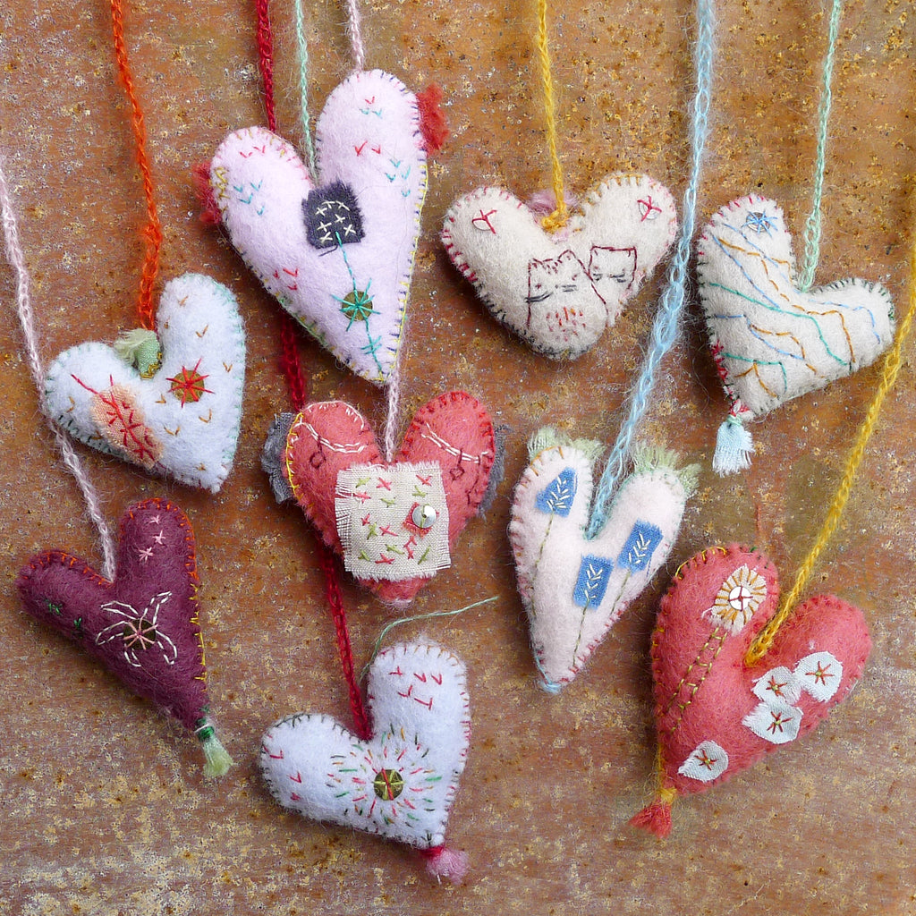heavily stitched felt hearts