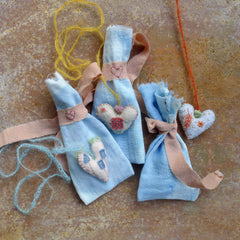 heavily stitched felt hearts
