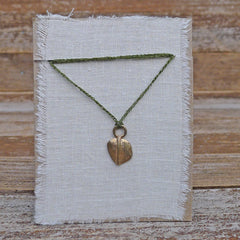 single charm necklace: leaf