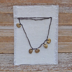 five charm necklace: pebble and pond