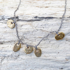 five charm necklace: pebble and pond