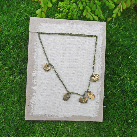 five charm necklace: pebble and pond