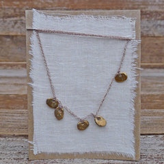 five charm necklace: pebble and pond