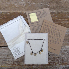 five charm necklace: pebble and pond