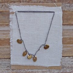 five charm necklace: pebble and pond