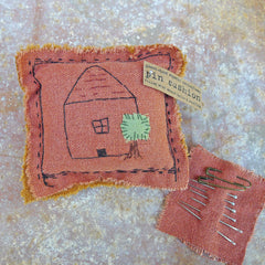 pin cushion: terracotta/house