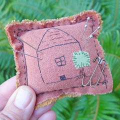 pin cushion: terracotta/house